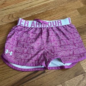 Purple under armour shorts, size youth medium.